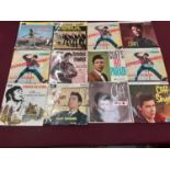 Vintage case of 30 Cliff Richard EP's, together with a vintage case of single records on the Coral a