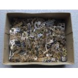 Large collection of British Military Staybrite cap badges and shoulder titles (1 box)