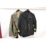 Group of military uniform to include Royal Navy jackets, Sam Browne belt and other uniforms (1 box)