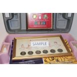 World - Two boxes containing mixed coins, medallions and coin accessories to include a glass framed