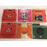 Selection of Beatles singles and EP's including Decca pressings, label variations and International