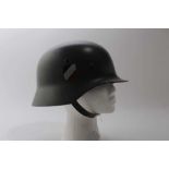 Good quality reproduction Nazi German M35 pattern Wehrmacht helmet, complete with transfers, leather