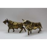 Two large and very heavy brass models of bulls