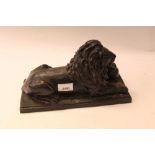 Bronze model of a seated lion