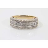 18ct gold diamond three row ring with baguette cut diamonds flanked by two rows of brilliant cut dia