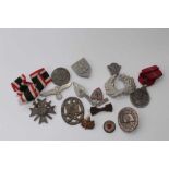 Collection of Second World War Nazi badges and insignia to include RAD badge, War badge, Eastern fro
