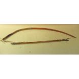 Antique pygmy bow and small arrows