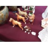 Five Royal Doulton and Beswick Boxer Dogs