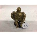 Car mascot in the form of the Michelin man, mounted on base, approximately 10.5cm excluding base