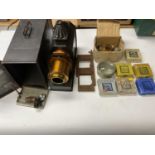 Victorian magic lantern with seven boxes slides