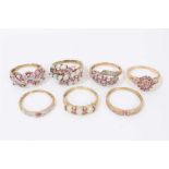 Seven 9ct gold pale pink gem stone dress rings