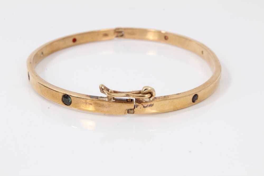 9ct gold hinged bangle set with eight multi coloured sapphires - Image 2 of 6