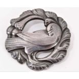 Georg Jensen silver brooch of a bird with wreath surround