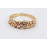 Clogau 18ct gold diamond ring set with three princess cut diamonds in rub over setting with raised l