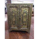 19th century Chinese lacquer table cabinet with gilt decoraton and pair of hinged doors opening to r
