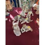 Collection of eight Lladro and NAO animal ornaments, including cats, dogs and geese