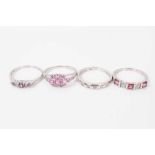 Four 9ct white gold pink stone dress rings