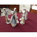 Four Lladro porcelain figures and a Nao figure (5)