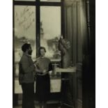 Pamela Chandler (1928-1993) portrait of the photographer with sculptor Ben Enwonwu and his bust of H