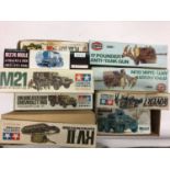 Selection of boxed military construction kits including Tamiya, Airfix, Revell, mixture of construct