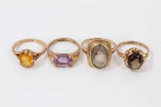 Four 9ct gold gem set rings