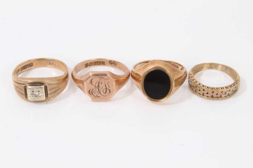 Four 9ct gold rings