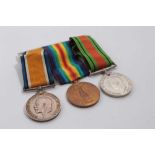 First / Second World War medal trio comprising War and Victory medals named to G - 63538 PTE. N. W.