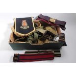 Collection of mixed militaria to include Second World War gas mask in case, canvas webbing belts, an