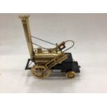 Good quality model of a three-wheeled steam driven carriage together with a battery operated Stephen