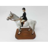 Beswick horse with female rider, on plinth base