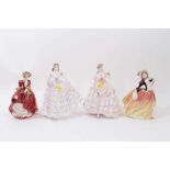 Two Royal Doulton figures together with two Royal Worcester figures
