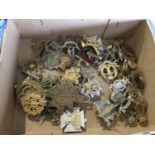 Collection of approximately 50 British Military cap badges including Army Cyclist Corps, RAMC and 12