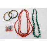 Antique coral three strand graduated bead necklace, malachite necklace and two malachite bangles