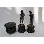 Pair of figures on serpentine bases together with a circular casket