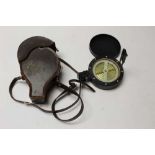 Leather cased prismatic surveying compass with black lacquered finish