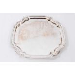 Contemporary silver salver of square form, raised on four feet, Sheffield 1979, maker Poston Product