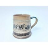 Royal Doulton stoneware tankard, decorated with sheep by Hannah Barlow, marks to base