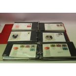 Stamps box of GB and World covers in albums including 1977 Silver Jubilee, Cats Thematic issues and