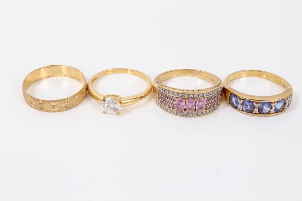 Four 18ct gold dress rings