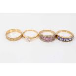 Four 18ct gold dress rings