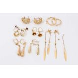 Seven pairs 9ct gold earrings including hoops, cuffs, drops and bells