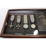 Collection of seven miniature medals comprising C.B.E., M.V.O. First World War Victory medal, 1935 S