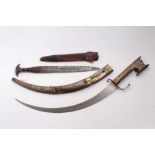 Eastern sword with curved steel blade in wooden sheath with inlaid decoration, together with an Afri