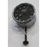 Vintage car clock by British Jaeger with black Roman numeral dial