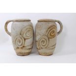 Large pair of Bourne Denby pottery jugs, with coiled circle pattern in relief, 36.5cm high