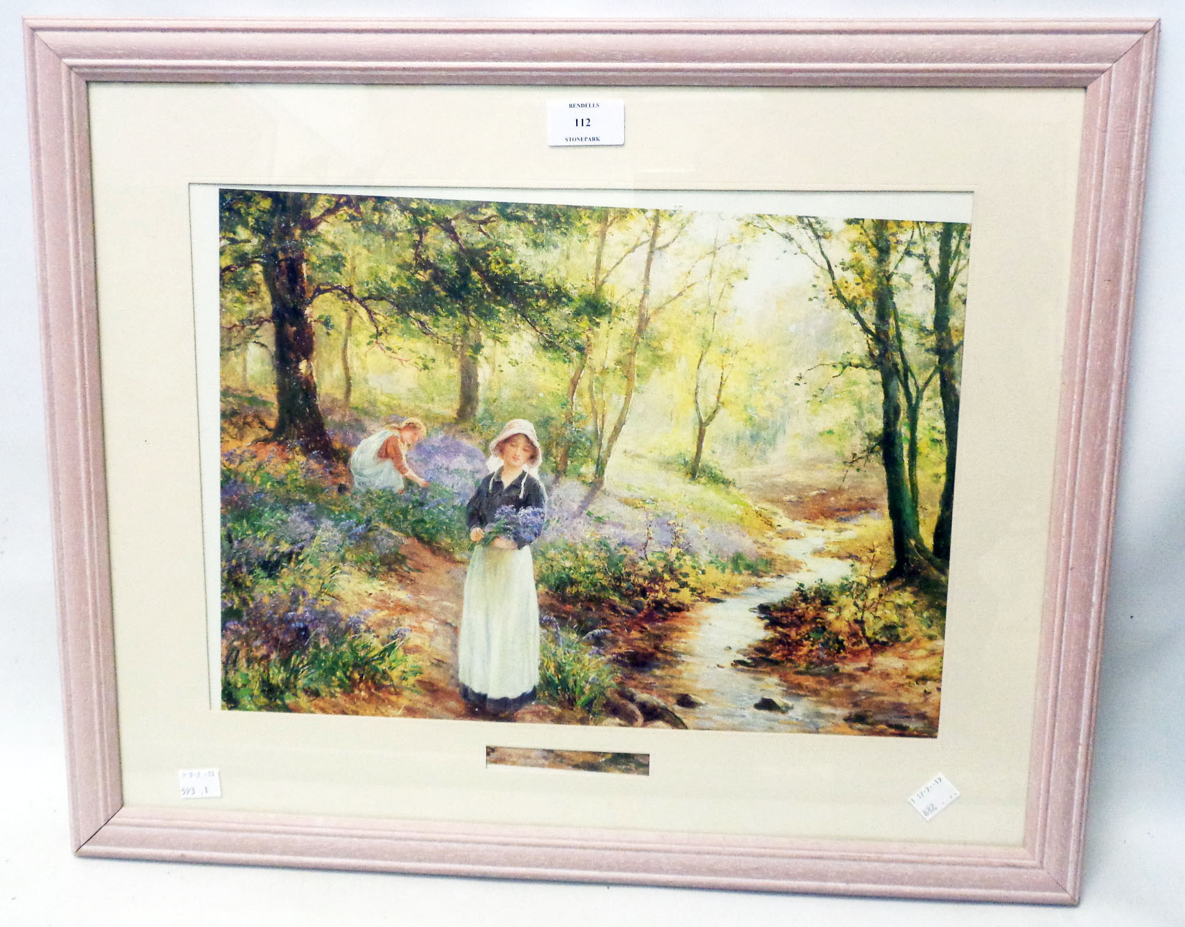 A framed coloured print, depicting women picking bluebells - slipped in frame