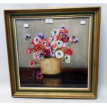 A gilt framed oil on canvas under glass still life with pot of flowers - indistinctly signed