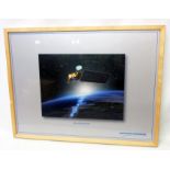 A large framed coloured print, depicting the Aqua Spacecraft (Northrop Grumman)