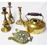A selection of brass items comprising kettle, a pair of elephant stem candlesticks, 18th Century