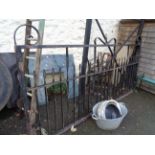 A pair of heavy ornate wrought iron entrance gates - to fit approx. 4.10m including hangers - sold